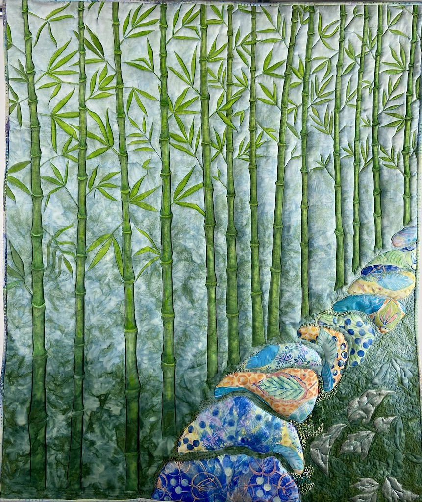 Art quilt by Allison Wilbur of a bamboo grove with a brightly colored stepping stone path.