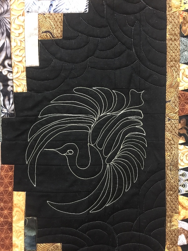 Detail of Quilt by Valerie Daniels Rossi with Japanese fabrics and quilting motifs